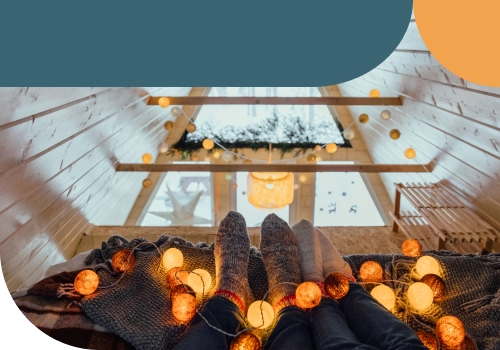 A couple laying in a loft together